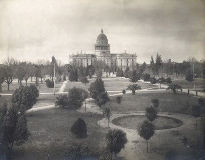 East side of the State Capitol building, dome and grounds circa 1904